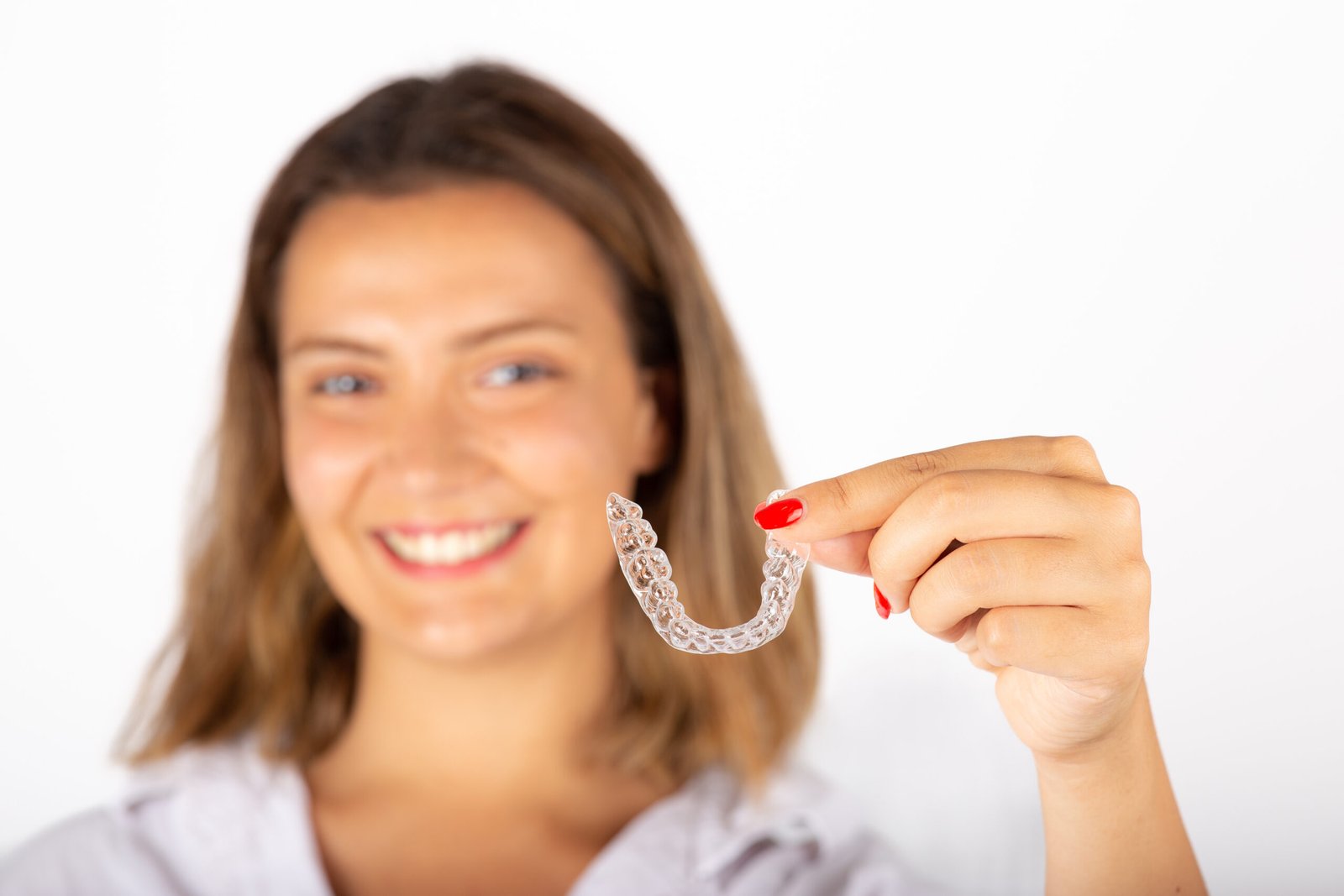 Invisalign Slowly Changes Your Smile, Here's What to Look For