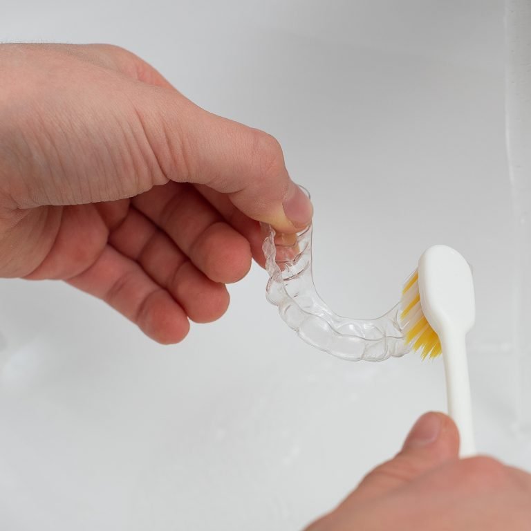 Do I Clean My Invisalign Every Time I Take Them Out?