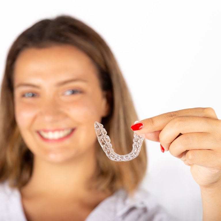 Invisalign Slowly Changes Your Smile, Here's What to Look For
